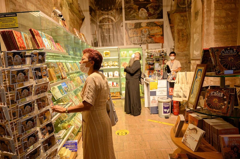 Tourists visit the souvenir shop of the Chora or Kariye Museum. AFP