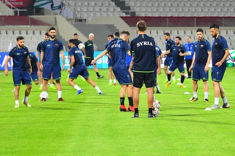 Syria's national team attends a training session at Sharjah Stadium. AFP
