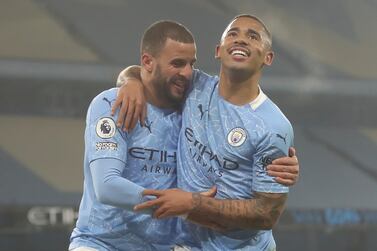 Manchester City's Gabriel Jesus, right, celebrates with Kyle Walker after scoring the second goal against Wolves. EPA
