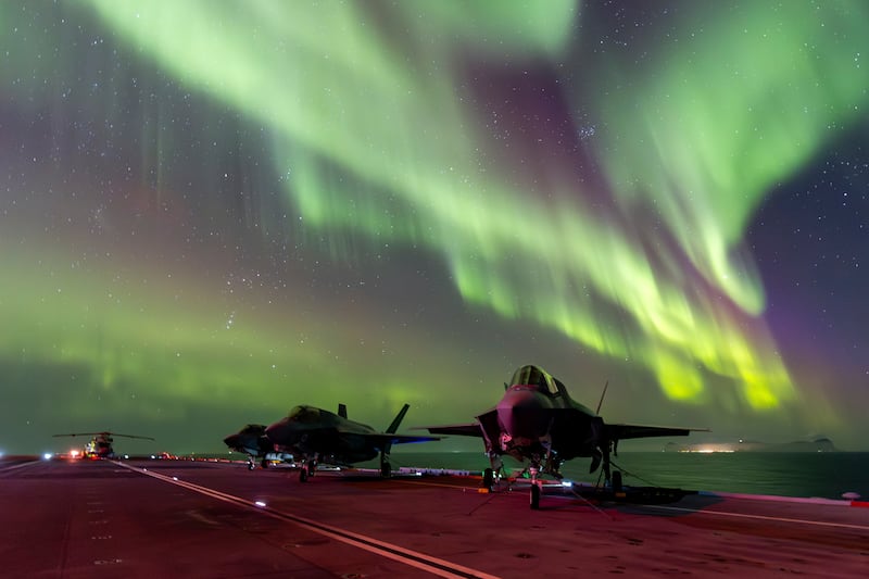 The Northern Lights illuminate the sky above F-35B Lightning jets on the flight deck of the Royal Navy's HMS Prince of Wales, off the coast of Norway. AP