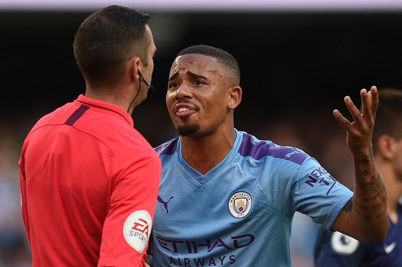 Manchester City's Brazilian striker Gabriel Jesus (R) remonstrates with English referee Michael Oliver after his goal was dissallowed following a VAR decision during the English Premier League football match between Manchester City and Tottenham Hotspur at the Etihad Stadium in Manchester, north west England The match ended in a draw at 2-2.  AFP