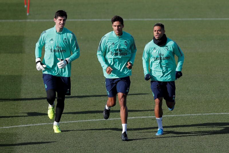 Real Madrid's Thibaut Courtois, Raphael Varane and Mariano Diaz during training. Reuters