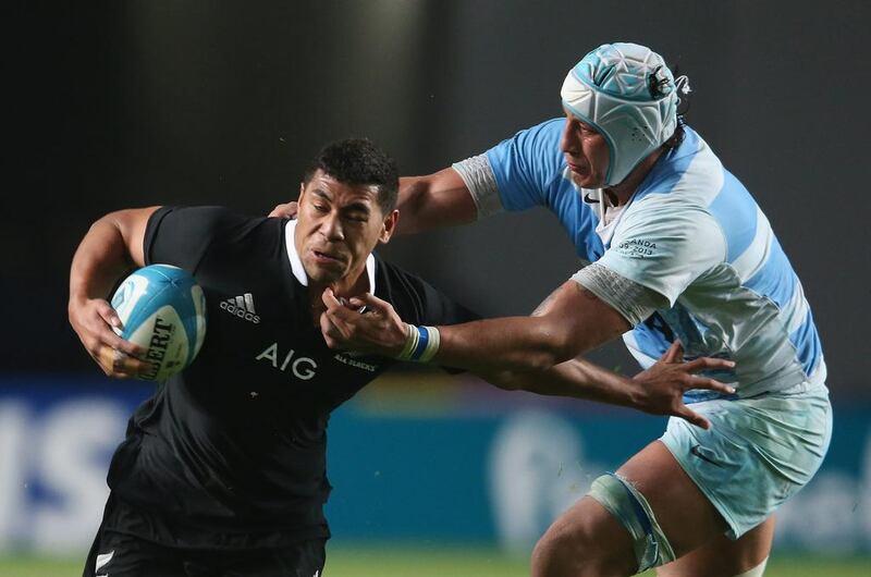 Charles Piutau of the All Blacks is tackled by Argentina's Patricio Albacete. David Rogers / Getty Images