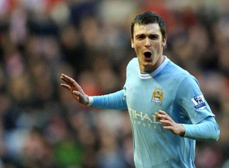 Adam Johnson knows he has a lot of hard work to do if he is to make the final squad of 23.