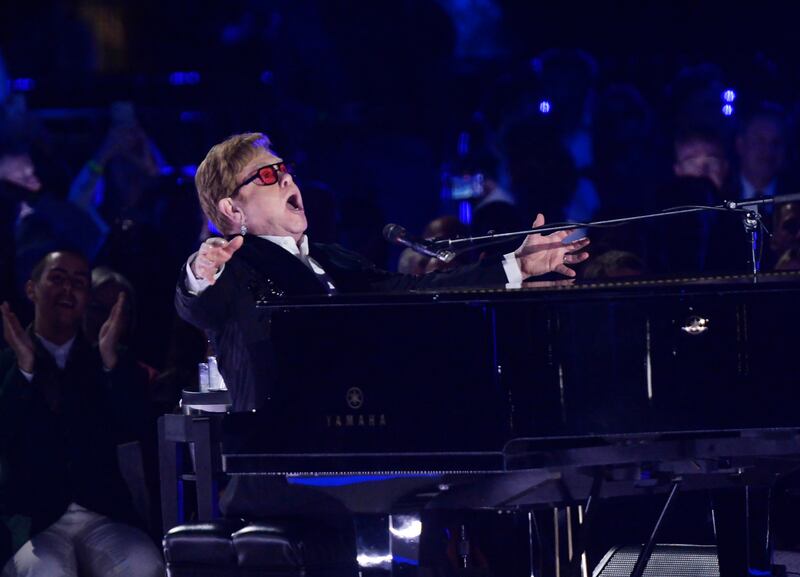 British pop star Sir Elton John sings for his White House supper. EPA