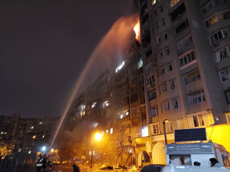 Firefighters tackle a blaze in a building in Kiev. AFP