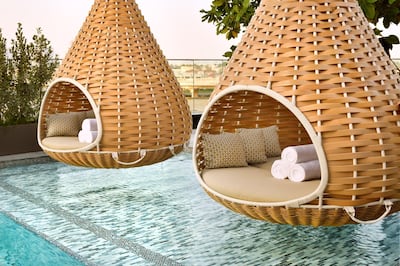 Hanging pods at the 25-metre infinity pool. Courtesy IHG Hotels & Resorts