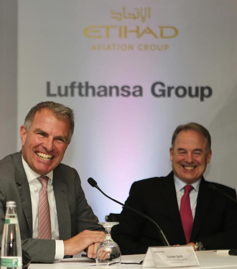 Carsten Spohr, left, the chief executive of Lufthansa, and Etihad's chief executive James Hogan said that aviation deals make globalization possible for other industries. Kamran Jebreili / AP Photo