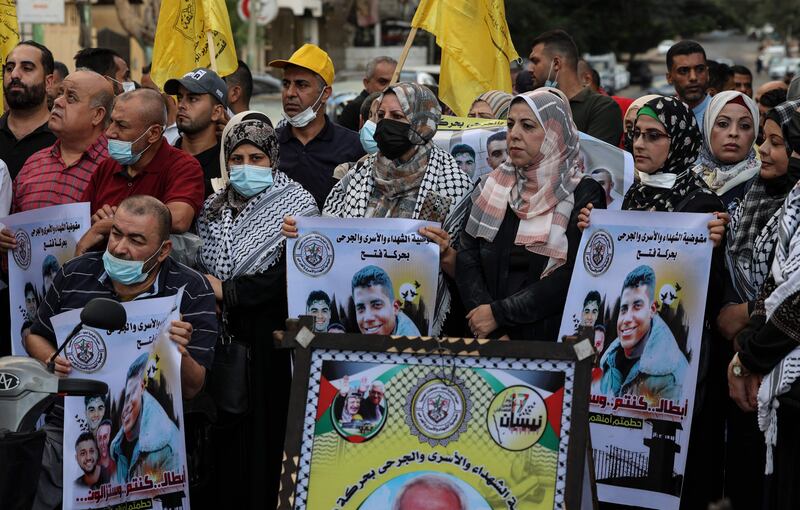 Backers of the Fatah movement in Gaza city demonstrate in support of the prisoners who escaped from Israel's Gilboa jail last week. AFP