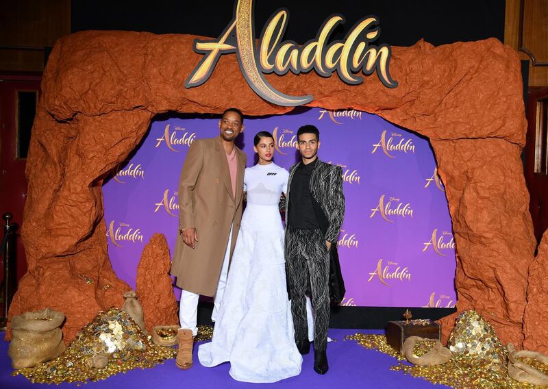 Will Smith, Naomi Scott and Mena Massoud at the screening. Getty Images