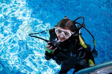 Ellie May Craig, 10, who lives in Dubai, has become one of the world’s youngest certified scuba divers. Reem Mohammed / The National