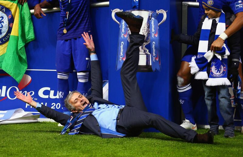LONDON, ENGLAND - MARCH 01:  Manager Jose Mourinho of Chelsea on the pitch as Chelsea celebrate with the trophy during the Capital One Cup Final match between Chelsea and Tottenham Hotspur at Wembley Stadium on March 1, 2015 in London, England.  (Photo by Clive Mason/Getty Images)