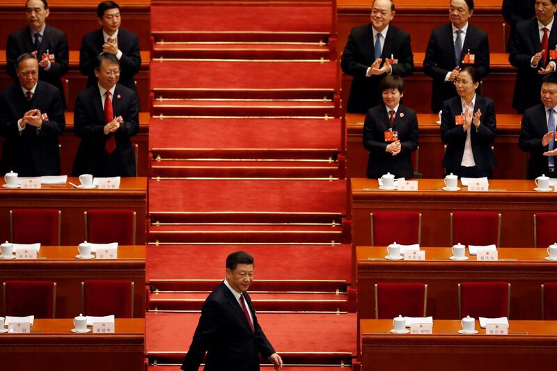 Chinese President Xi Jinping arrives for the opening session of the annual National People's Congress in Beijing's Great Hall of the People, Monday, March 5, 2018. (AP Photo/Ng Han Guan)