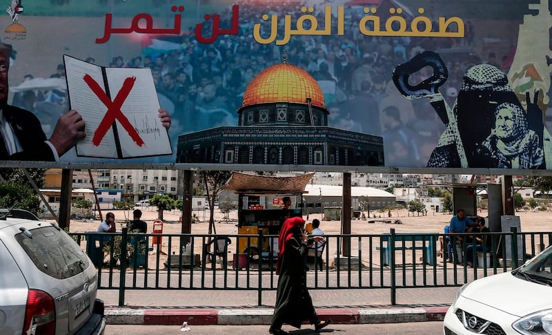 A poster in Gaza City denounces the US Middle East peace plan dubbed the "deal of the century". AFP