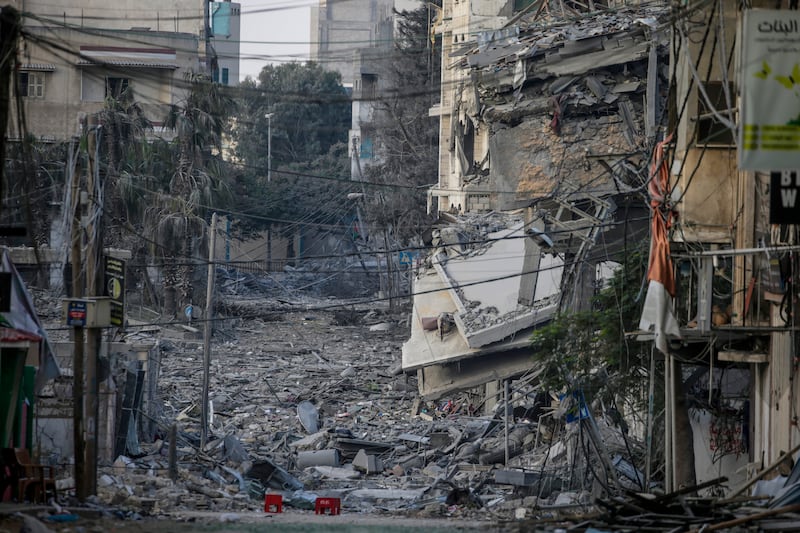 An area with destroyed buildings is deserted after residents of Gaza city began to evacuate. EPA
