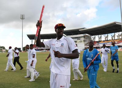 ST JOHN'S, ANTIGUA AND BARBUDA - FEBRUARY 02:  West Indies captain Jason Holder celebrates with his team after winning the match on Day Three of the 2nd Test match between West Indies and England at Sir Vivian Richards Stadium  on February 02, 2019 in St John's, Antigua and Barbuda. (Photo by Shaun Botterill/Getty Images,)