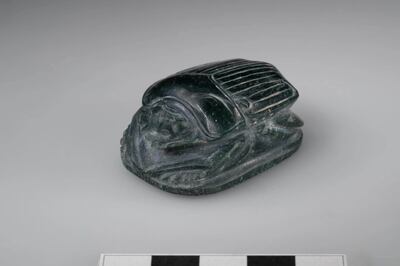 A scarab found inside the tomb of Wahibre-merry-Neith, a 26th dynasty dignitary who commanded the country's foreign military forces. The tomb had been robbed in the 4th or 5th century AD so the scarab was one of a handful of relics found inside the tomb. Photo: Ministry of Tourism & Antiquities
