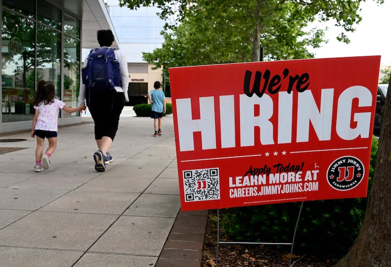 The US added 199,000 jobs in November. AFP