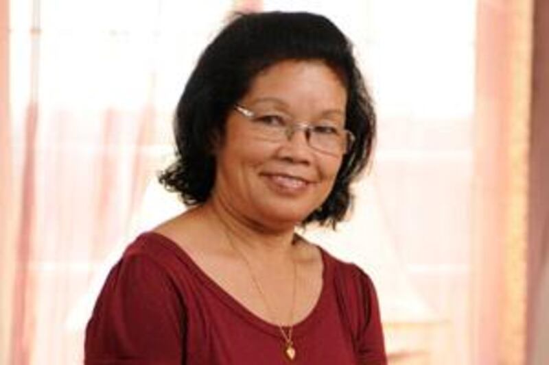 Lily Matudan, from the Philippines, working as a housemaid in Dubai, United Arab Emirates photographed at a villa on Wednesday, July 15, 2009. Photos: Charles Crowell for The National *** Local Caption ***  Lily Matudan 01.jpg