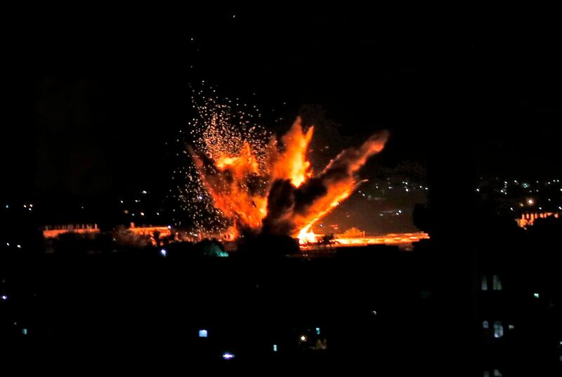 Fire and smoke billow following Israeli air strikes targeting Rafah in the southern Gaza Strip, near the border with Egypt, last month. AFP