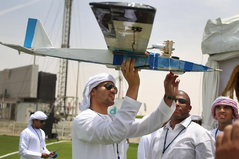 Mohammad Abdulla Al Dhari prepares a final check of his team’s aerial vehicle before flight. Delores Johnson / The National