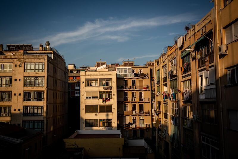 Sunlight hits residential apartments in the Sant Antonio neighborhood of Barcelona, Spain, on Tuesday, June 4, 2019. After seeing housing costs jump by more than 50% in the past five years, officials in Barcelona are moving to introduce Spain's most aggressive rent controls. Photographer: Angel Garcia/Bloomberg