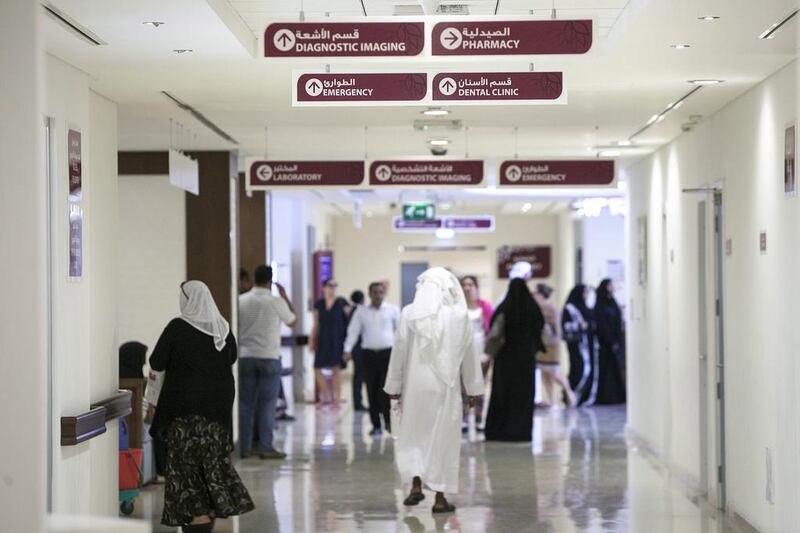  People stream through the halls of Burjeel Hospital in Abu Dhabi. Silvia Razgova / The National



