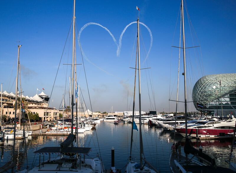 Al Fursan aerobatics demonstration team of the United Arab Emirates Air Force at the Yas Marina Abu Dhabi Grand Prix. Victor Besa / The National