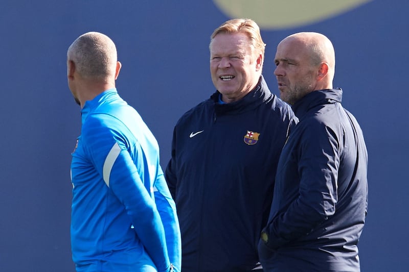 FC Barcelona's Dutch head coach Ronald Koemam (C) with his staff Alfred Schreuder (R) and Henrik Larsson (L) during a training session at Joan Gamper Sports City in Barcelona, Catalonia 26 October 2021 in preparation for their next LaLiga match against Rayo Vallecano.   EPA / Alejandro Garcia