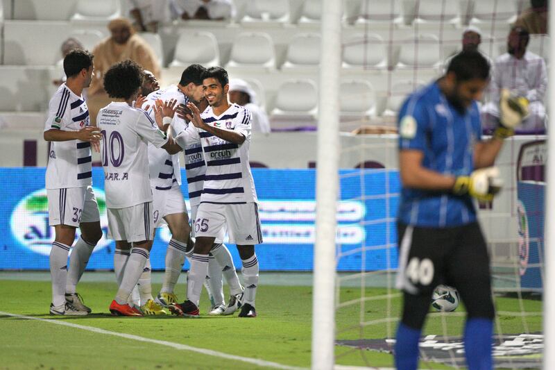 Al Ain, United Arab Emirates, Jan 26, 2013 -  Al Ain players celebrate the 4-0 goal against  Ajman at Tahnon bin Mohamed Stadium.  ( Jaime Puebla / The National Newspaper ) 