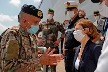 French Defence Minister Florence Parly speaks with a Lebanese army brigadier general upon disembarking from the French Navy amphibious assault helicopter carrier Tonnerre at Beirut port on August 14, 2020. AFP