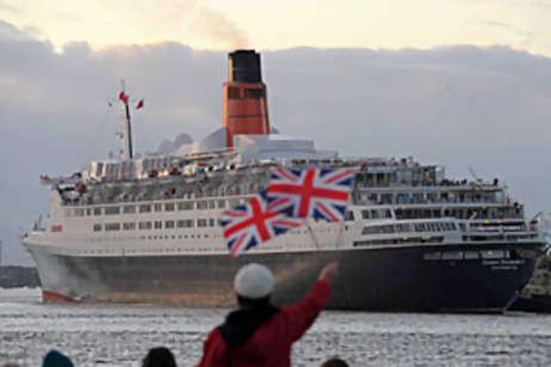 The Queen Elizabeth 2 puts into port at Southampton for the final time yesterday as Britons bade farewell to the giant ship.