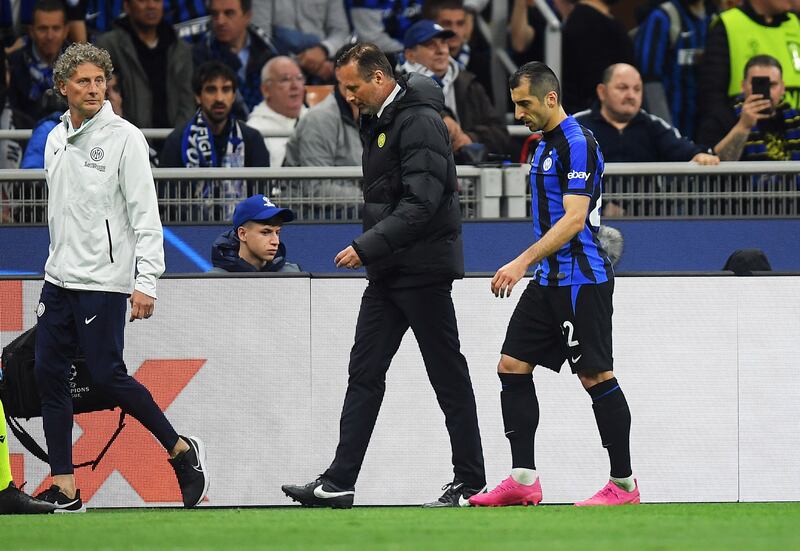 Inter Milan's Henrikh Mkhitaryan leaves the pitch after sustaining an injury. Reuters
