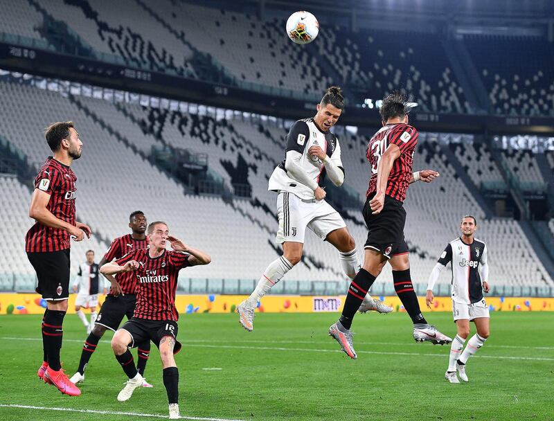 Ronaldo leaps for a header. EPA