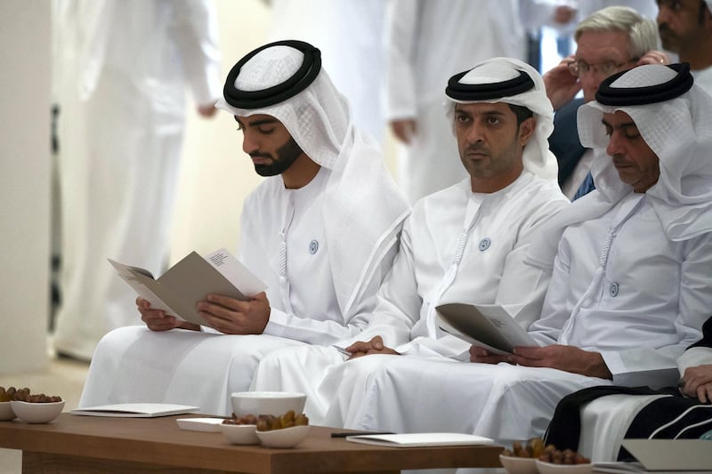 ABU DHABI, UNITED ARAB EMIRATES - May 30, 2018: (L-R) HH Sheikh Humaid bin Ammar bin Humaid Al Nuaimi, HH Sheikh Abdulaziz bin Humaid Al Nuaimi and HH Lt General Sheikh Saif bin Zayed Al Nahyan, UAE Deputy Prime Minister and Minister of Interior, attend a lecture by HE Razan Al Mubarak titled, ’For The Love of Nature: Innovative Philanthropy for Species Conservation Worldwide’, at Majlis Mohamed bin Zayed.

( Hamad Al Kaabi / Crown Prince Court - Abu Dhabi )
---