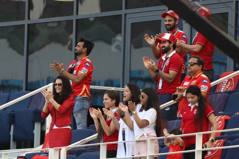 Preity Zinta, front left, cheers Punjab Kings at the Dubai International Stadium on Thursday. Sportzpics for IPL
