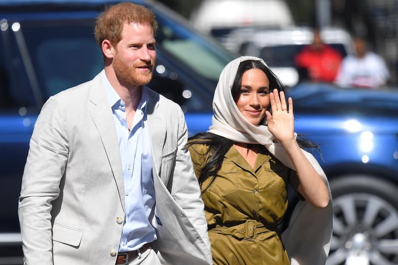 The Duke and Duchess of Sussex, Prince Harry and his wife Meghan, arrive at Auwal Mosque. Reuters