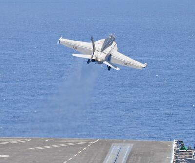 An F/A-18 Super Hornet takes off from a US aircraft carrier. Photo: US Navy