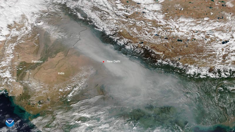 A satellite image from National Oceanic and Atmospheric Administration (NOAA) shows smog lingering over New Delhi. AFP