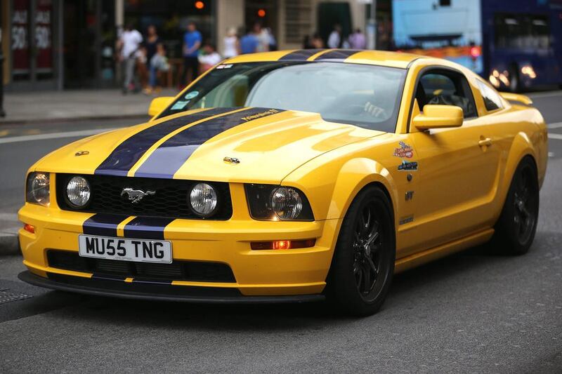 A Ford Mustang drives through Kensington, London, one of many supercars owned by wealthy Arab tourists which descend on the capital over the summer months. Dan Kitwood / Getty Images