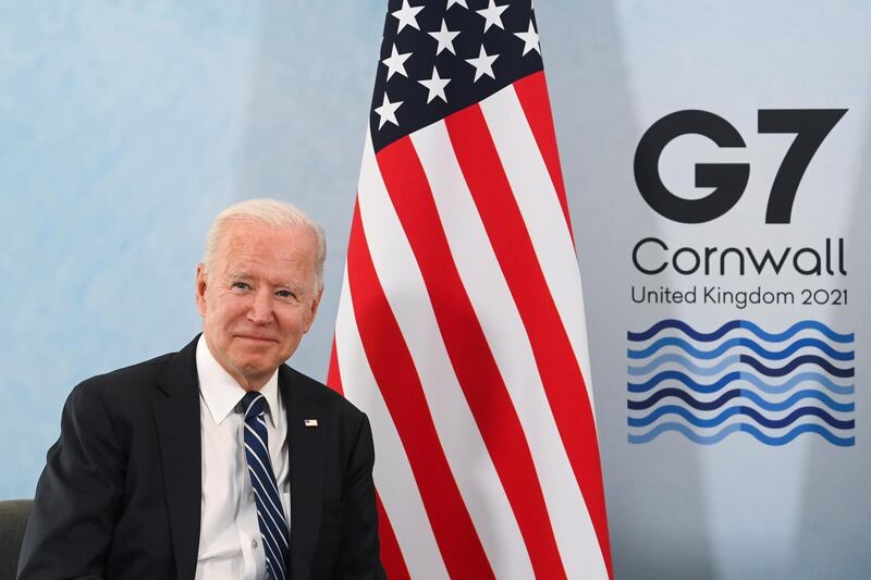 U.S. President Joe Biden poses for a picture during a meeting with Britain's Prime Minister Boris Johnson (not pictured) ahead of the G7 summit, at Carbis Bay, Cornwall, Britain June 10, 2021. REUTERS/Toby Melville/Pool