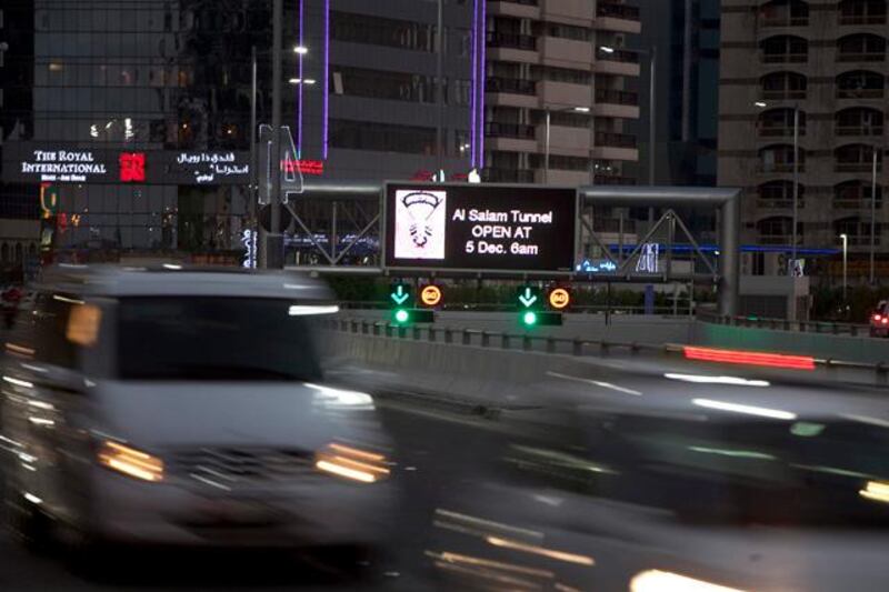 Abu Dhabi, United Arab Emirates, December 04, 2012:  
Traffic downtown Abu Dhabi still bypasses the new Salam Tunnel on Tuesday evening, Dec. 4, 2012, as the cars trail above ground around it. Traffic at the tunnel is set to open at 6am the following day.   Silvia Razgova / The National


