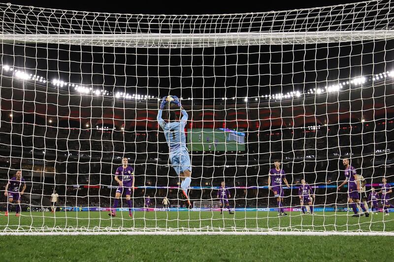 Perth Glory goalkeeper Tando Velaphi makes a save against Manchester United. Getty Images