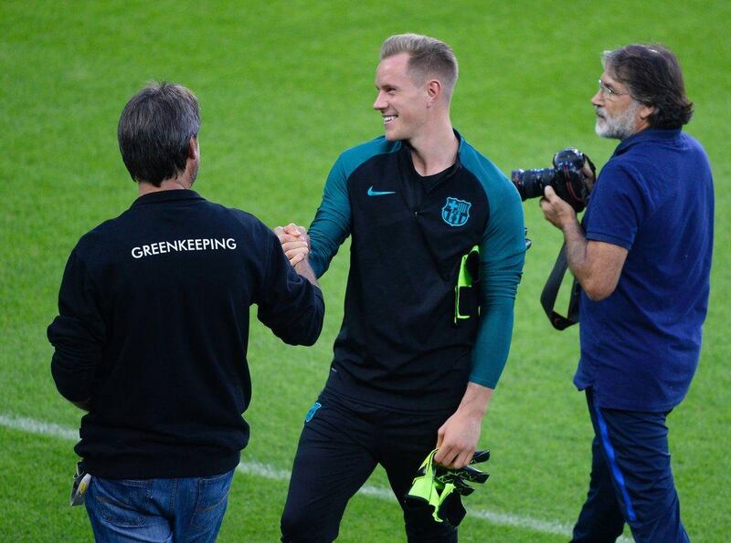 Barcelona’s goalkeeper Marc-Andre ter Stegen, centre, attends a training session. Roberto Pfeil / AFP