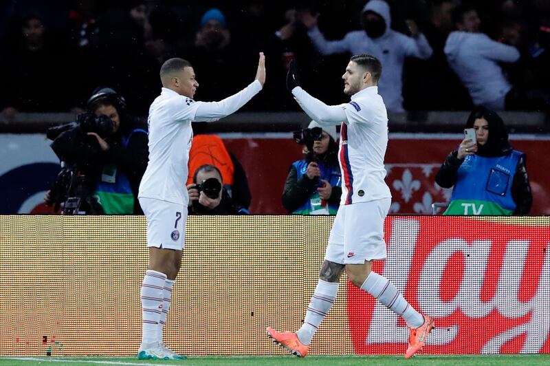 PSG's Mauro Icardi, right, celebrates with Kylian Mbappe after scoring the opening goal. AP