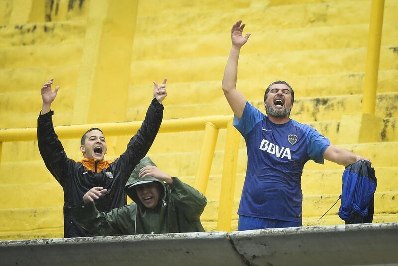 Fans of Boca Juniors cheer their team. Getty Images