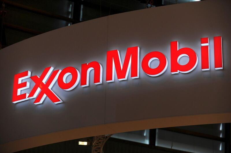 (FILES) In this file photo taken on June 02, 2015 a picture shows the logo of US oil and gas giant ExxonMobil during the World Gas Conference exhibition in Paris. ExxonMobil announced December 14, 2002 it will reduce its emissions over the next five years bowing to growing public pressure from activists, including the Church of England, to make changes.  / AFP / ERIC PIERMONT
