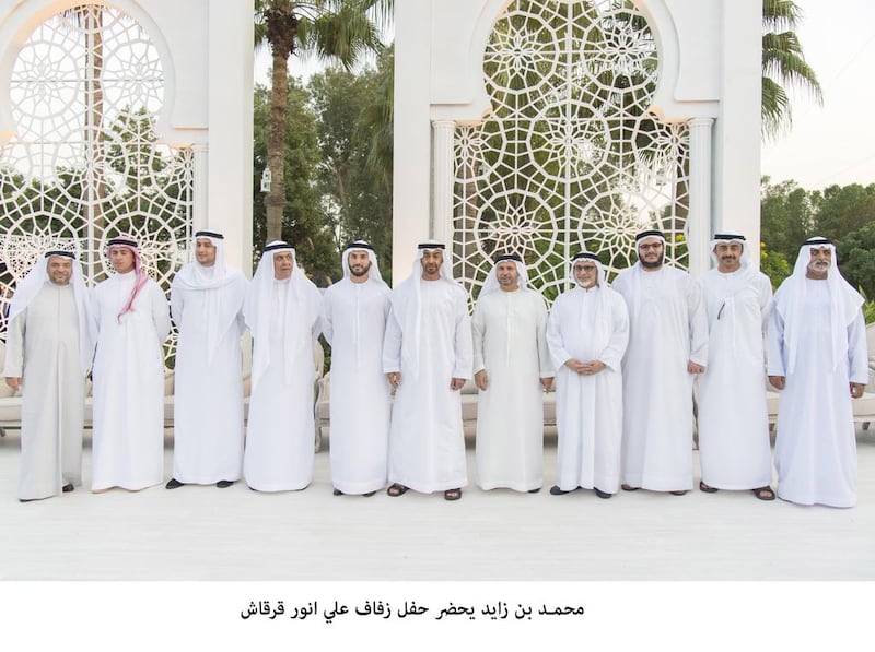Sheikh Mohammed bin Zayed, Crown Prince of Abu Dhabi and Deputy Supreme Commander of the Armed Forces, stands for a photograph during the wedding reception of Ali Anwar Gargash (5th L), Dr Anwar Gargash, Minister of State for Foreign Affairs (7th L), Sheikh Abdullah bin Zayed, Minister of Foreign Affairs and International Cooperation (2nd R) and Sheikh Nahyan bin Mubarak, Minister of Culture and Knowledge Development (R). Mohamed Al Suwaidi / Crown Prince Court - Abu Dhabi
