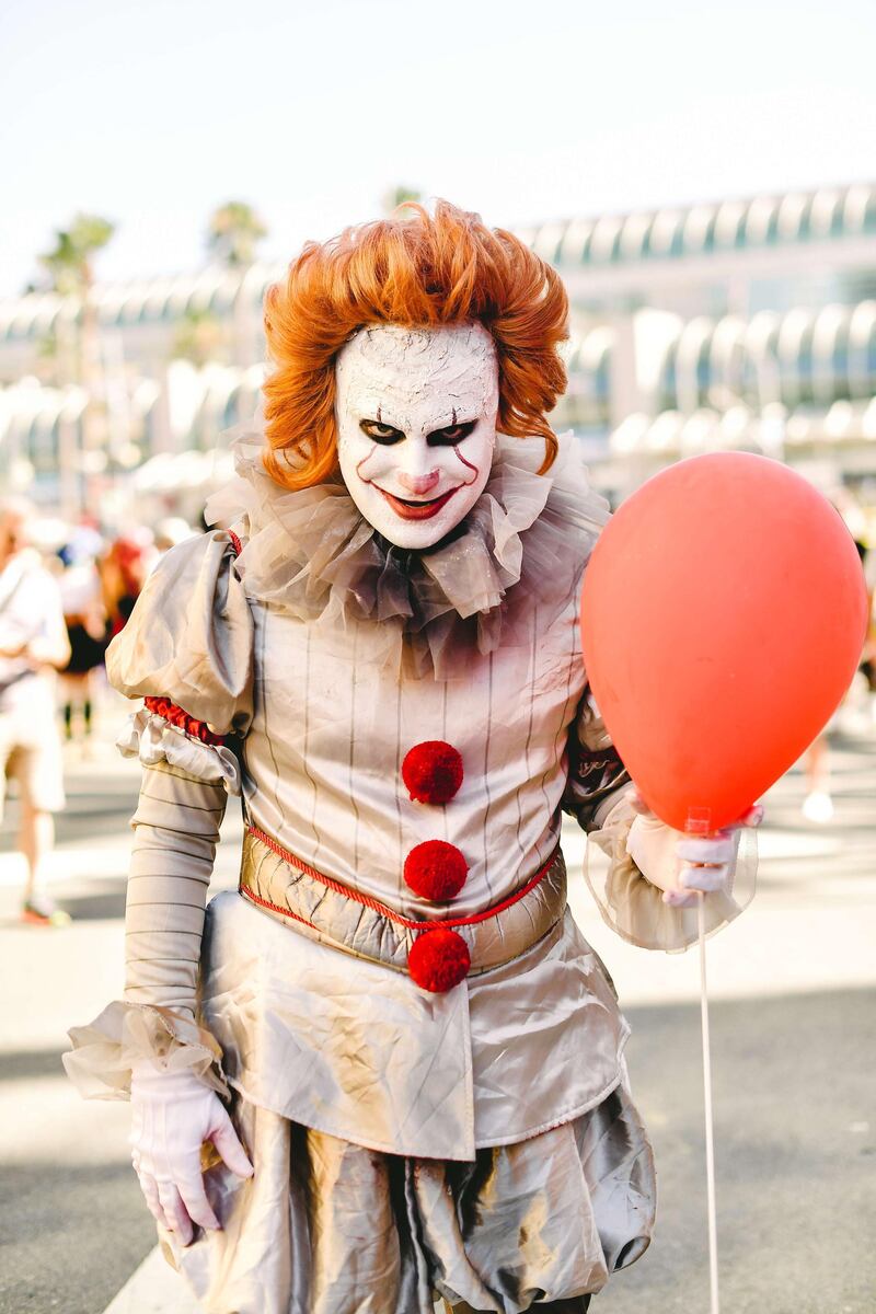 A cosplayer as Pennywise the Dancing Clown from It. AFP