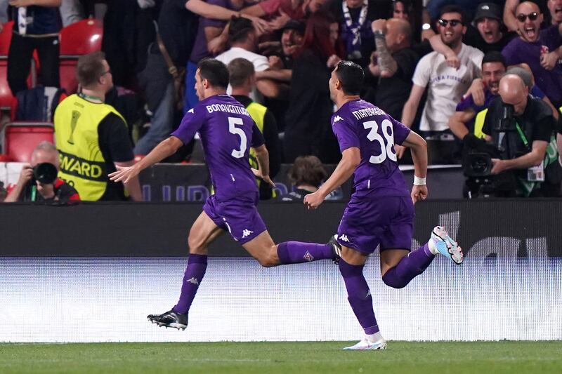 Fiorentina's Giacomo Bonaventura, left, celebrates after scoring their first goal. PA 